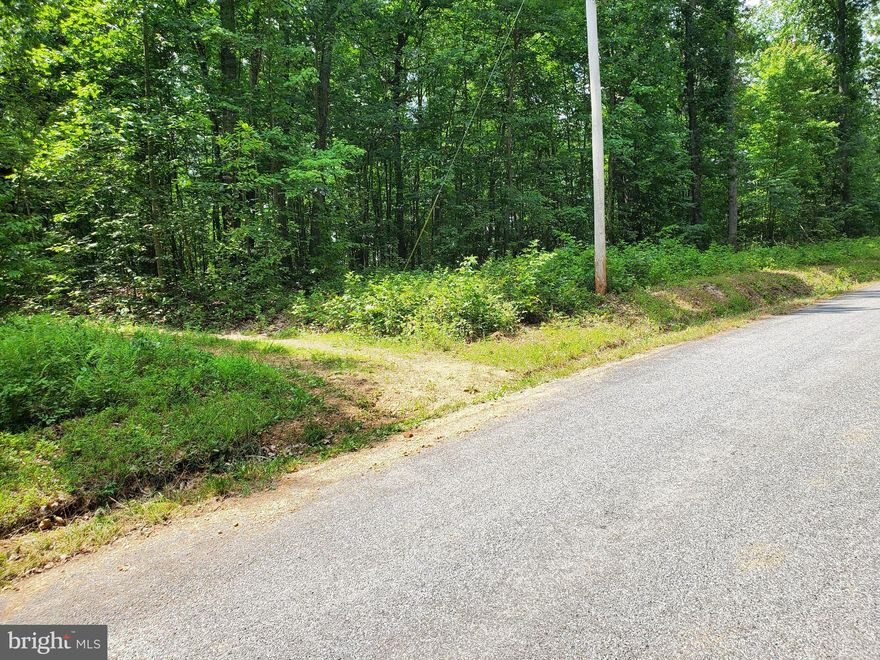 Beautiful  5.71 acres Vacation Way is also flat on top hill road is dirt but easy to travel Close to Sleepy Creek and about a mile from Shanglai Store