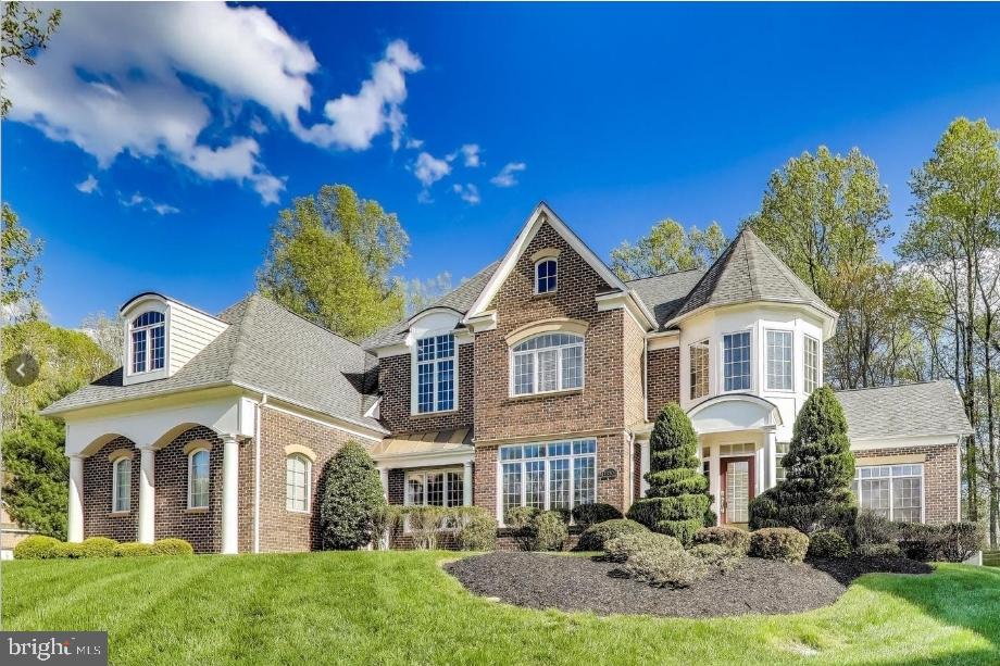 Coming soon! Open house, Satuday August 23, 2025 10am-12pm. Additional photos being uploaded by professional photographer
Welcome to Woodmore North!
Nestled on nearly one acre at the end of a peaceful cul-de-sac, this stunning three-level home offers almost 9,000 square feet of luxurious living. With dramatic high ceilings, expansive windows, and private bathrooms in every bedroom, this residence was designed for both comfort and elegance.
Step into the grand foyer and to your right, you’ll find the inviting family room with a soaring vaulted ceiling, gas fireplace framed by custom built-ins, and floor-to-ceiling windows that flood the space with natural light. The gourmet eat-in kitchen features abundant cabinetry, sleek granite countertops, double wall ovens, and an oversized island perfect for gathering. A bright morning room with tree-lined views creates the ideal spot for casual dining.
Beyond the butler’s pantry, the formal dining room is perfectly suited for hosting dinners and holiday gatherings, complete with a tray ceiling and chair rail molding. The adjacent living room continues the home’s elegant feel with wainscoting and expansive windows. French doors open to a private office with hardwood floors, built-in shelving, and a wall of windows, while the sunroom offers a cozy retreat for reading or relaxing.
Upstairs, the luxurious primary suite impresses with a curved wall of windows, tray ceiling, and generous sitting area. The spa-inspired en suite bathroom includes a dual vanity, soaking tub, and oversized shower. Three additional bedrooms each feature walk-in closets and private baths. A spacious laundry room with sink is conveniently located on the bedroom level.
The finished lower level offers endless possibilities, with a large recreation room, wet bar, tiered media room, two bonus rooms, and two full bathrooms—ideal for a home gym, additional bedrooms, or playroom.
Outdoor living is just as impressive, with a private, tree-lined backyard and a three-car garage with a long driveway for ample parking. Recent updates include a new roof (2019) and HVAC system (2022).
Perfectly located near everyday conveniences and attractions—just one mile from Safeway, Starbucks, and Fairwood Community Park, and minutes to Wegmans, Bowie Town Center, Six Flags America, NASA Goddard, Bowie State University, and more. Easy access to I-495, I-95, Route 50, and the BW Parkway ensures a quick commute in any direction.
Don’t miss your chance to call this exceptional property home!