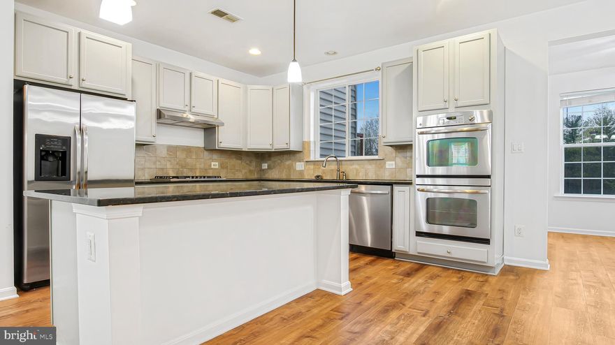 ***UPDATE*** Offering $2,500.00 credit for new carpet.  Welcome to this gorgeous, fully renovated 3-bedroom, 3.5-bathroom home that blends modern style with energy efficiency. With a spacious 2-car garage and driveway, this property offers convenience and ample parking space. Designed with attention to detail, this home features several LED recessed lights throughout, creating a bright and welcoming atmosphere.

Key Features:

Updated Kitchen: Enjoy the brand-new stainless steel cooktop and ventless hood, paired with new cabinets and a breakfast bar. Premium stainless steel appliances and a fresh paint job make this kitchen a chef’s dream.

New Flooring: The kitchen, sunroom, eat-in kitchen, and entire basement boast durable LVP flooring, while the laundry room, Jack-and-Jill bathroom, and basement full bathroom feature sleek, new ceramic tiles.

Upgraded Bathrooms: Modern vanities and stylish finishes complete the upgraded bathrooms, providing a spa-like experience in the comfort of your own home.

New Entry Door: A stunning new entry door with glass allows for natural light and ventilation, welcoming you into this beautiful home.

Spacious Living: The carpeted areas, including the living room, formal dining room, and all upstairs bedrooms, feature carpets that are only 3.5 years old. Additionally, accent walls in the living room and master bedroom add a touch of elegance and style.

Energy Efficiency: Benefit from energy-efficient features that help reduce utility costs and enhance comfort year-round.

Garage Upgrades: The garage boasts new epoxy flooring, offering a clean and durable surface.

Fresh Paint: All interior walls and ceilings have been freshly painted, along with baseboards and doors, ensuring a pristine and modern feel throughout the home.

Convenience: New toilet paper holders in all bathrooms add to the newly updated, thoughtful details.

Outdoor Activities Nearby: Take advantage of several outdoor activities just moments away, including parks and walking trails.

Prime Location: Starbucks, retail shops, and a variety of dining options are just around the corner. Plus, easy access to I-495 makes commuting a breeze.

This home truly has it all—modern upgrades, energy efficiency, and a location that provides convenience at your doorstep. A must-see!