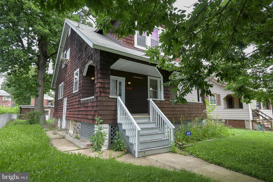 MOVE IN READY! LOVELY AND ADORABLE HOME FEATURES ORIGINAL WOOD FLOORS AND CLOSET DOORS WITH THE ORIGINAL GLASS KNOBS AND BUILT IN'S IN THE LARGE DINING ROOM. SPACIOUS KITCHEN WITH BACK ROOM IDEAL FOR STORAGE OR PANTRY. REC ROOM IN LOWER LEVEL. LARGE FENCED REAR YARD!  LOCATION CLOSE TO PIMLICO RACE TRACK, 695 AND ROUTE 83 MAKES FOR AN IDEAL COMMUTE. NEAR SINAI AND NORTHWEST HOSPITALS.