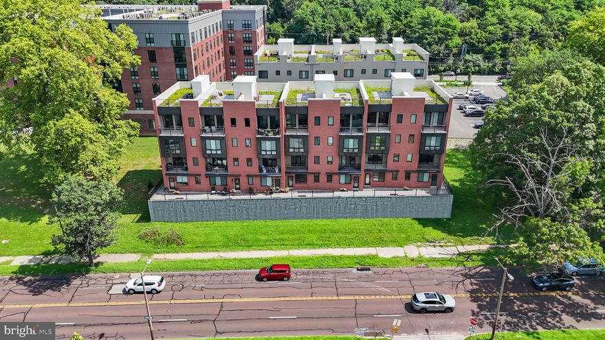 Luxury 4-Story Townhome with Breathtaking River Views & Premium Amenities
Welcome to your dream home—an exquisite 3-bedroom, 3.5-bathroom townhome just off Kelly Drive, offering unparalleled views of the Schuylkill River and direct access to the scenic Schuylkill River Trail. Perfectly located near premier dining and recreation, this residence combines modern elegance with the convenience of low-maintenance living.
Step inside to find soaring ceilings and an open, light-filled floor plan anchored by a chef-inspired kitchen. The expansive marble top island, sleek stainless steel appliances (including a wine fridge), upgraded cabinetry, marble backsplash, recessed lighting and under cabinet lighting make this space as functional as it is beautiful. Double sliding glass doors lead to a private balcony off the living room—just one of three incredible outdoor spaces, all offering river views.
The crown jewel is the private rooftop deck, where you’ll find a retractable awning, mounted TV, built-in grassy area, with space to garden. Whether you're enjoying your morning coffee or entertaining under the stars, the panoramic views are simply unmatched.
Additional highlights include:
A full laundry room for added convenience
A rear-entry 2-car garage
Elevator access to all four levels, featuring a rear window to take in the view as you move through the home
The "café room" with access to one of the balconies with custom cabinetry, sink, and beverage cooler—ideal for casual hosting or morning routines
The luxurious primary suite offers a spacious sitting area, custom closet system, and a spa-like en-suite bath with double sinks and a glass-enclosed shower. Each bedroom features its own private bathroom, with Bedroom 2 boasting double closets for ample storage.
Beyond your private oasis, enjoy exclusive access to a neighboring amenities building just steps away. Relax in the stylish common lounge with fireplaces, stay active in the state-of-the-art fitness center or yoga studio, or gather with friends on the community rooftop deck or ground-floor patio. There’s even a pet salon to pamper your furry friends.
With four years remaining on the tax abatement, this is a rare opportunity to own a truly exceptional townhome in one of the most desirable areas of Philadelphia.
Luxury, lifestyle, and location—don’t miss your chance. Schedule your private tour today!