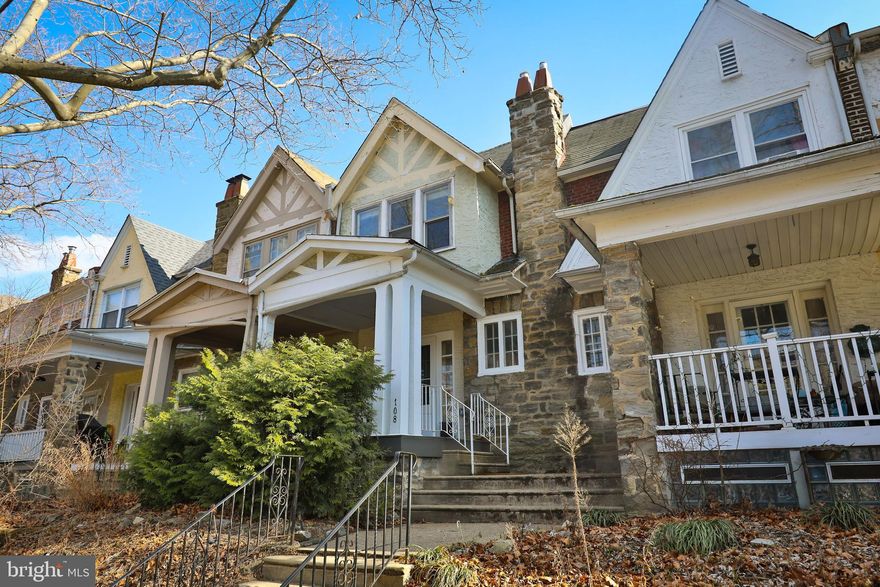 This charming townhouse with garage parking occupies a quiet, coveted, tree-lined block in East Mount Airy just a short walk from the amenities of Germantown Avenue in both Mount Airy and Chestnut Hill.  This delightful residence offers a perfect blend of classic architecture and modern comforts, along with many recent upgrades from the current owners including a brand new boiler and new front porch (2024), new roof coating (2023), new electrical wiring and chimney liner (2022), and much more, so you can move right in! The covered front porch and landscaped front garden welcomes you home into a spacious open concept living/dining area. Hardwood parquet floors, decorative mantelpiece, and original woodwork exude warmth and character. A bright and spacious kitchen with ceramic subway tile backsplash, quartz countertops and ample cabinet space provide plenty of space for cooking with room for breakfast bar or island. Upstairs, you'll find three generously sized bedrooms, each offering abundant natural light. The full hallway bathroom with skylight maintains a classic charm with timeless fixtures. The basement has the laundry and plenty of storage space. This location offers super convenient access to the SEPTA train station and the 23 bus line into Center City, making commuting a breeze. Enjoy this great home in a wonderful community and easy access to the trails of the Wissahickon, local coffee shops, restaurants, shops, grocery stores and more.