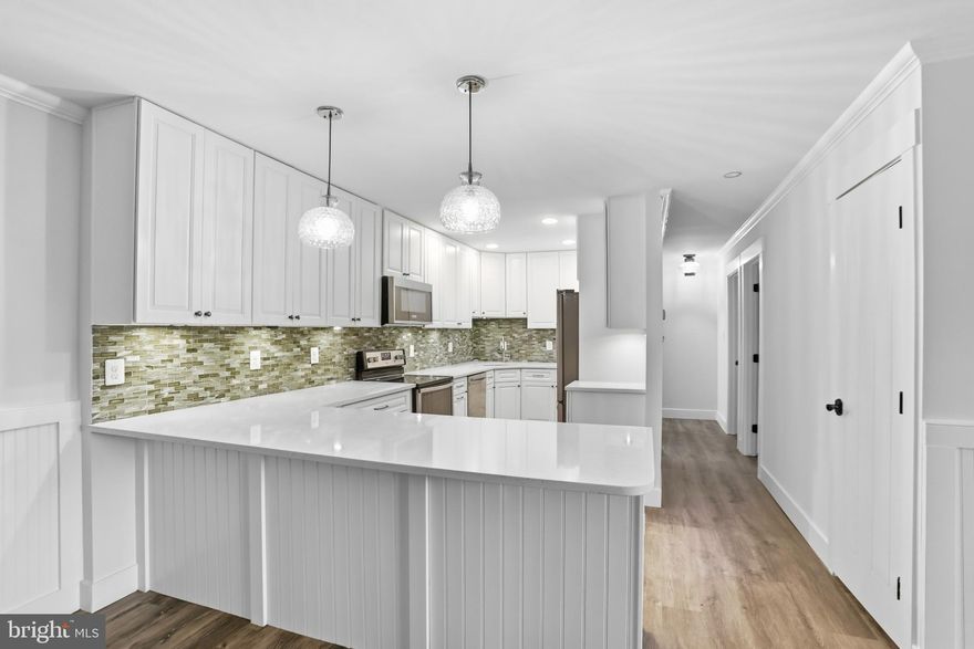 Top-floor condo in Pembrooke of Loudoun with impressive updates throughout! This 2-bedroom, 1-bath home is move-in ready and offers quality finishes throughout. The kitchen was expanded and fully renovated in 2018, featuring white cabinetry, quartz countertops, stainless steel appliances, and a peninsula with bar seating — a wonderful space for cooking and entertaining. The open floor plan flows beautifully with luxury vinyl plank flooring, and the living room's sliding glass door opens to a Juliet balcony, bringing in great natural light. The primary bedroom offers a generous walk-in closet, and the entire unit has just been freshly painted, making it truly turnkey. Bonus storage with the cedar closet in the hallway. Heat pump and tankless water heater both installed in 2018. Commuters will love the easy access to Route 7, Route 28, and the Dulles Toll Road, putting all of Northern Virginia within easy reach. Whether you're a first-time buyer, downsizer, or investor, this well-appointed condo delivers tremendous value in a convenient Loudoun County location.