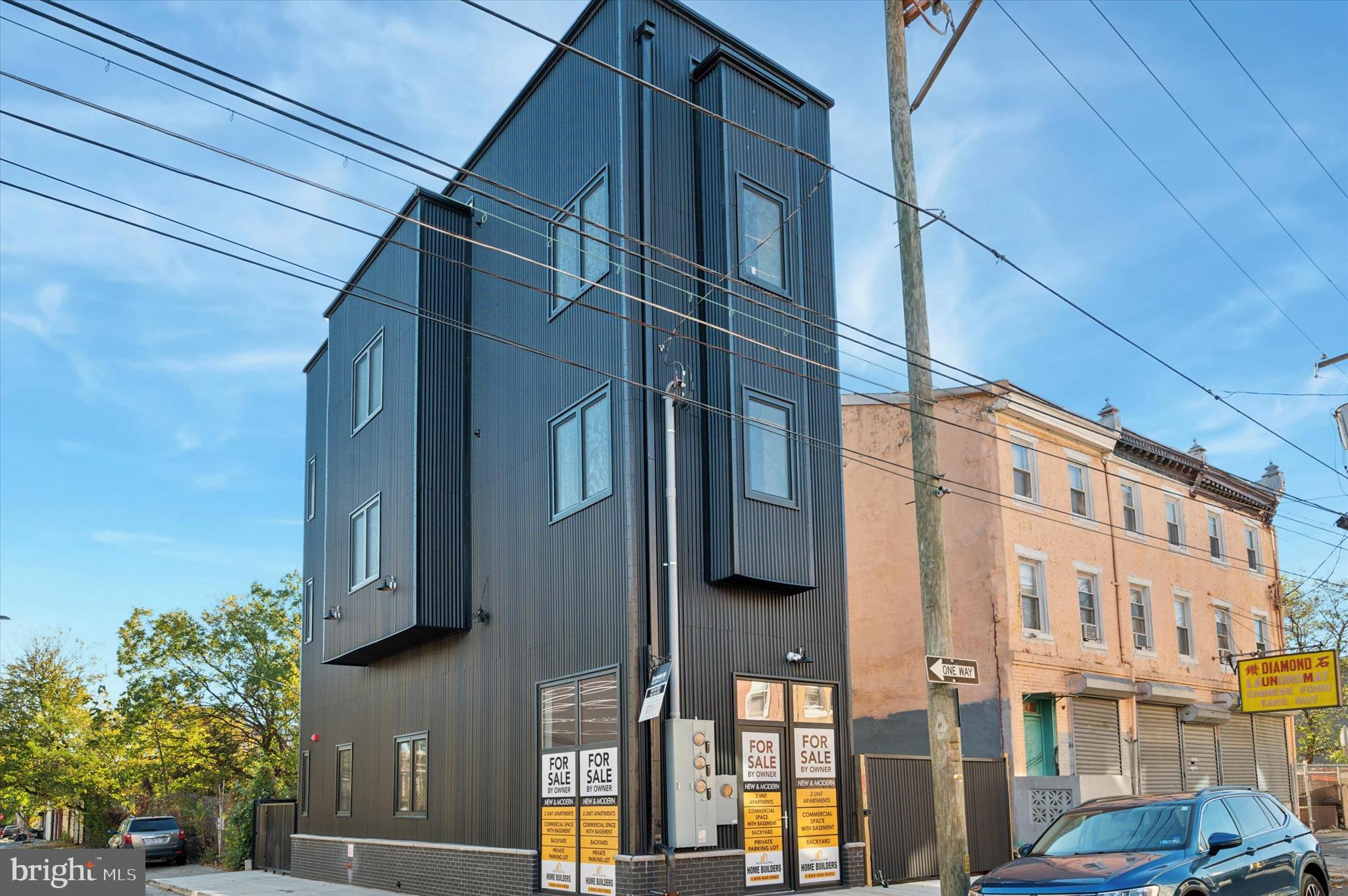 This prime mixed-use investment NEW CONSTRUCTION opportunity in West Kensington features a versatile three-unit building with one commercial and two residential spaces, ideal for generating multiple income streams. The commercial unit, prominently located on a corner with excellent visibility, includes a bi-level layout with a finished basement and easy access to parking, making it ideal for retail or office use. The two residential units, each 1-bedroom, 1-bath, are privately accessed from the rear of the building and feature soaring 10+ foot ceilings that create an open, airy feel. Situated on a 13 x 57 ft lot with approximately 80% lot coverage, this property offers both location and appeal, making it an attractive option for tenants and a rewarding opportunity for investors in West Kensington’s vibrant market. All 3 units give an owner occupant or investor the opportunity to vet, and select their tenants for all 3, or 2/3 units while living in 1 unit. This gem is not to be missed!
