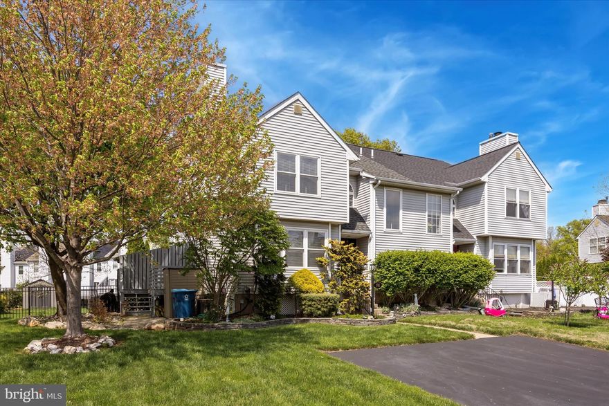 Welcome to 191 Eric Lane!  This picture-perfect, meticulously maintained 2-bedroom end-unit townhome is located in the sought-after Village at Gwynedd community. A beautifully landscaped garden provides a warm welcome as you approach the front door.  Step into a sun-drenched, two-story foyer that sets the tone for the rest of the home. Gorgeous hardwood floors flow throughout the first level, adding warmth and sophistication. The spacious living room is filled with natural light and features a cozy fireplace.  Adjacent to the living room is an inviting kitchen, complete with stainless steel appliances and a breakfast bar that opens seamlessly to the dining area. The dining room boasts a charming shiplap accent wall and sliding glass doors that lead to a private deck.  A convenient half bath completes the main floor.  Upstairs, you’ll find a generously sized primary bedroom with direct access to the full bathroom, which also connects to the hallway for added functionality. The second bedroom is bright, cheerful, and offers plenty of space.  The finished lower level offers a versatile flex space—perfect for a home office, gym, or media room. You’ll also find a dedicated storage area, laundry space, and a utility room.  Additional highlights include off-street parking for two cars. Situated in Upper Gwynedd Township within the North Penn School District, this home offers easy access to major commuting routes, SEPTA Regional Rail, shopping, dining, parks, and more.  Don’t miss this incredible opportunity to own a charming home in a great location!