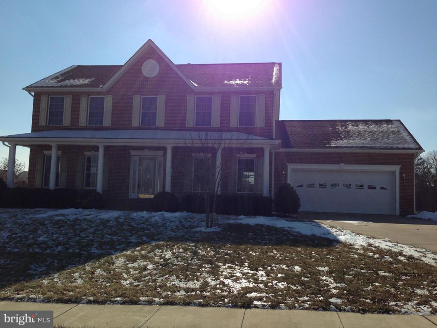 **PRICE REDUCED**Ready to move in! Nice corner lot with fenced in back yard* Brick Front with covered porch. Two car garage.New Paint and Carpet. Beautiful hardwood floors on main floor*Gas Fireplace in family room. Huge Master suite with trey ceiling and master bath. Spacious  bedrooms. Come see you won't be disappointed.