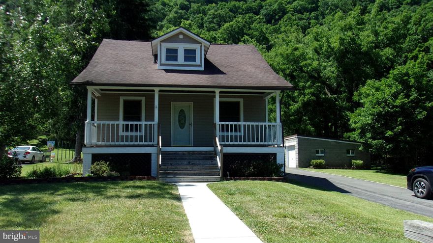 VERY NICE 2 BDRM - 1  1/2 BATH HOME ON OVER AN ACRE OF LAND! LG FT PORCH FOR LOUNGING! LIV RM OPENS TO THE DIN RM AND DEN AREA - 2 BDRMS ARE ON THE UPPER LEVEL AND FULL BATH - NEW HOT WATER HEATER 2024 - NEWER WINDOWS - NEW FURNACE 2 +/- YRS - NEW BATHROOM - NEW GAZEBO 2 +/- YRS - NEWER GAS LINES IN NEIGHBORHOOD - NEWER ELECTRIC WITH A SEP BOX FOR A GENERATOR HOOK UP - SELLER STATED THERE IS WOOD UNDER THE CARPET THROUGH MOST OF THE HOME - FULL BSMT - DETACHED 2 CAR GARAGE - NEW SURVEY WILL BE PROVIDED TO THE NEW HOMEOWNER - MUST SEE PROPERTY