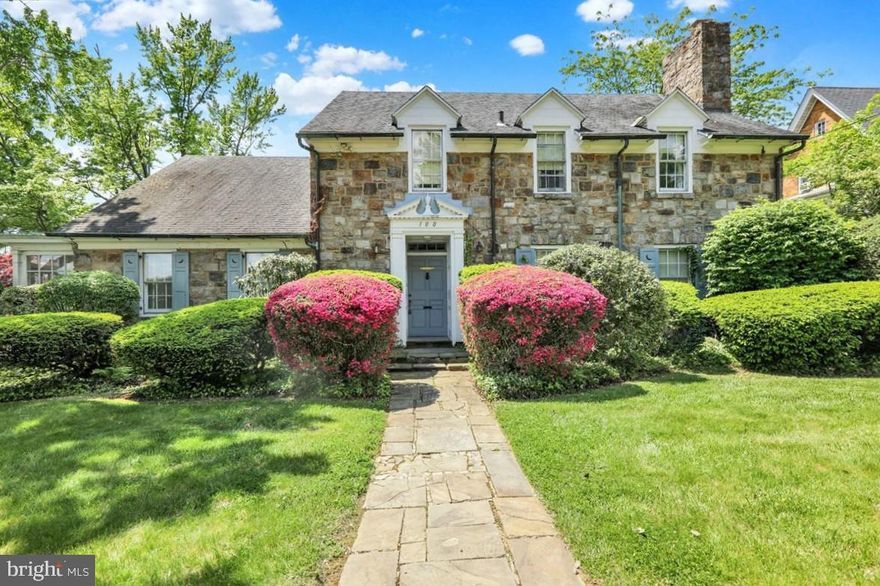Welcome to 100 Brookline Plaza – A Grand 1928 Stone Home Full of Charm and Possibility. Nestled on a beautifully landscaped corner lot, this 1928 all-stone traditional home offers timeless character, expansive living spaces, and incredible versatility. From the moment you arrive, the mature trees, flowering shrubs, and classic copper gutters speak to the home’s enduring craftsmanship and unique charm. Inside, you'll find a grand living room with a wood-burning fireplace, upgraded flooring, and custom built-in shelving—an inviting space for gatherings or quiet evenings. The formal dining room, with its built-in corner cabinets, opens to a lovely stone patio that invites outdoor entertaining. A screened-in porch through the living room connects to the patio and leads to a peaceful, private backyard surrounded by lush, established landscaping. The eat-in kitchen retains its functional, classic layout and features custom cabinetry with thoughtful touches like a pull-out pantry, a separate built-in pantry, and a wall oven—ready for you to make it your own. Every corner of this home holds original charm, from the deep window sills to the authentic hardware that has stood the test of time. Upstairs, a wide, stately staircase leads to 4 spacious bedrooms and a hall bath with retro tile—perfectly preserved or ready for your personal updates. The 4th bedroom is made of a primary suite spanning the  two walk-through rooms and includes a fireplace, a tiled en-suite bath with a glass stall shower, and a private balcony overlooking the courtyard. Currently used as a two-room suite, this flexible space could easily accommodate a nursery, extra bedroom, private office, or cozy sitting area with a built-in window seat. There is an additional dedicated library or office area with a cedar closet that adds to the home's charm and functionality, with access to a large attic offering storage or future living space potential.
One of the home’s most distinctive features is a completely separate wing—previously used by a medical professional—that opens the door to countless possibilities. With its own private entrances, this space includes a front room ideal for a waiting area, living room, or consultation space, and a second room with gorgeous built-in cabinetry that could serve as an office or dining room. A full kitchen, butler-style pantry setup, and a full bathroom with a stall shower make this area fully independent and ripe for use as an in-law suite, rental unit, creative studio, or small business space. The home includes a two-car attached garage and a carport, and the full basement offers abundant storage and houses the home's updated systems, including a newer water heater and oil heat. This is a rare opportunity to own a one-of-a-kind home where original beauty meets extraordinary potential.  Great location, local to a Berk's County award winning private school, Alvernia and Albright Universities, and Tower Health Reading Hospital.  Whether you envision restoration or renovation, 100 Brookline Plaza is ready to inspire. Let your imagination take the lead—reminiscent of old Wyomissing style charm, this grand residence is full of possibilities.