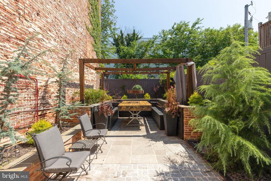 CHARMING 1 BEDROOM 1 BATH APARTMENT LOCATED IN THE HEART OF FELLS POINT WITH SHARED ROOFTOP DECK AND GARDEN PATIO! Building consists of 5 units and was renovated in 2019. This unit features hardwood floors throughout, updated kitchen w/ ss appliances and granite counters, a spacious bedroom, and full bath. All units have shared access to the garden patio w/ built-in seating and the rooftop deck. Located steps from Fells Point shopping and restaurants and convenient to the waterfront and Harbor East!