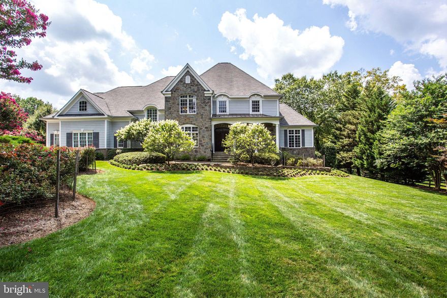 Gracious, stately living awaits on a private, one-acre lot in Vienna/Oakton area.  From the moment you enter this lovely home, you'll appreciate the finishing touches and attention to detail.  Warm Brazilian Cherrywood floors and a curved staircase greet you as you walk through the front door.  Beautiful entertaining space abounds with the formal dining room, formal living room, and amazing music/additional living room (the beautiful architectural detail of the ceiling and Palladian windows are not to be missed).  The back portion of the home including the kitchen and family room can be open to entertaining visitors or closed to provide privacy for family members.  A second staircase and elevator provide private access to the upper and lower levels of the house.    Amenities to make life easier during Covid abound!  Two offices and six bedrooms provide ample space for online work, online school, crafts, a home-based business, etc.  A separate media room offers private TV/movie viewing.  Enjoy the quiet, private space of the one-acre lot located on a cul-de-sac.  Cooking is a joy in the gourmet kitchen complete with a gas Thermador cooktop and Sub-Zero refrigerator/freezer.  A gracious family room with a coffered ceiling, a cozy gas fireplace, and built-ins adjoins the kitchen.  Beautiful, large windows let in an abundance of light throughout this home.  Additional features to make life more comfortable and gracious include a triple-zoned HVAC system, two tankless hot water heaters, kitchenette/wet bar in the basement (perfect for an in-law or au-pair suite), generous master suite with gas fireplace, elevator to all three levels, three-car side-load garage with additional work-space/utility sink, tasteful driveway with paving stones, loads of built-ins, and an elegantly landscaped yard.    Proximity to shopping, restaurants, parks, and transportation is an additional bonus.  Located just off of Hunter Mill Road this location provides easy access to Dulles Airport, I-66, Oakton Shopping Center,  Reston Town Center, Tysons Corner, downtown Vienna, and local parks.  Cycling enthusiasts are just minutes away from the W&OD trail on Hunter Mill Road (there is a parking lot where Hunter Mill and the W&OD cross).   Brand-new paint and carpet round out the amenities of this lovely home--it's definitely not to be missed!