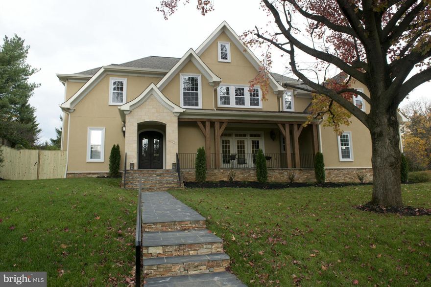 WOW! All this at this price for NEW HOME in the heart of Mclean!  Home features: fabulous entertaining space, an open floor plan, a gourmet kitchen with a six burner stove w/grill and wall of windows; 5 bedrooms, all with attached baths; a full finished basement with a media room and wet bar; a side loading garage. Fully fenced yard including a lawn sprinkler system.   LIVING SP 6464 SQ FT.