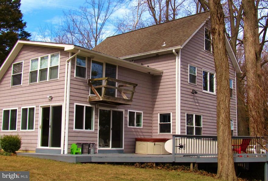 Spectacular hilltop property, panoramic water views, private steps to Little Round Bay.  Herald Harbor residents enjoy public beach and picnic area, tennis courts and playground. Renovated throughout with touches of original charm. 5th upper-level bedroom with separate sitting room. Master bedroom has attached full bath. Balcony on 2nd level, large deck ideal for entertaining.