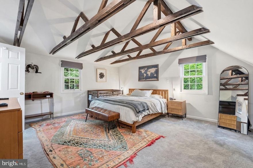 A rare find tucked along one of Silver Spring's quietest, most walkable streets — this three-bedroom, three-bathroom home delivers a perfect mix of tranquil living and storybook charm. Exposed beams and a fireplace anchor the interior with warmth and character, while the pedestrian-friendly street and private backyard make the everyday feel effortless. With three finished levels each offering its own bedroom and full renovated bathroom, the layout is as functional as the home is beautiful.
The main level functions as a complete living floor with a bedroom and full bath, making it ideal for guests or anyone who needs single-level accessibility. The third floor is dedicated entirely to the primary suite — a massive, private retreat with soaring lofted ceilings, brand new carpet, and its own renovated full bathroom. The finished basement rounds out the home as a third bedroom or in-law suite — fully self-contained with its own bathroom and separate from the main living areas.
All three bathrooms have been recently renovated. The backyard is private and fully enclosed, offering outdoor space without sacrificing privacy. The street itself is pedestrian-friendly and low-traffic, with easy access to everything Silver Spring has to offer.