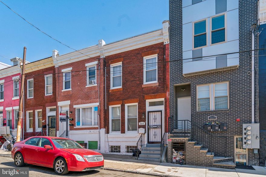 Beautifully renovated, exceptionally maintained, and nicely developed block just steps to the Temple University campus! Cozy living room with oak floors and decorator fireplace, eat-in kitchen with oak cabinets, granite tops, newer appliances, stackable washer/dryer. Generous main-floor bedroom and bathroom. Humongous outdoor area stretches nearly 100’. Updated hall bath with floor-to-ceiling ceramic tile and walk-in shower, great closet space. 2008-upgraded electric, plumbing, central HVAC, windows. Shows beautifully!