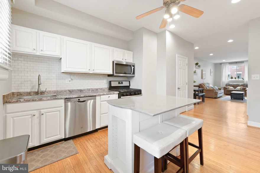 Brewers Hill’s hottest new listing is now available! This charming 3 bedroom, 1.5 bathroom WITH PARKING PAD literally checks all of the boxes. The owners made SUBSTANTIAL upgrades to the home after purchasing it so that the next owners will enjoy: a NEW half bathroom on the main level, fresh paint, a REAL third bedroom/office/nursey on the second floor, recessed lighting in bedrooms, a new kitchen island, freshly painted kitchen cabinets, new dishwasher, microwave and washer, a ring doorbell and new nest thermostat. This home has beautiful original hardwood flooring with intricate inlays on the main level and beautiful stained glass windows flooding with natural light. There is also a partially finished basement great for a rec-room/ party room and has plenty of storage. Brewers Hill is booming with new construction and tons of walkable amenities so don’t miss out on this excellent opportunity! Schedule your private showing today!