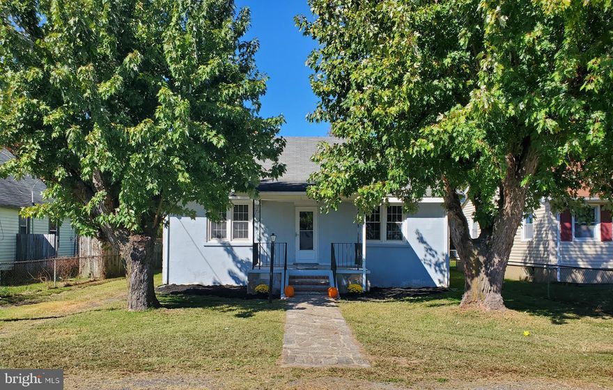 Classic 1940's cape cod style renovated for today's comfort while keeping the original charm.  Features first floor bedroom & full bath, spacious open living room/dining room; kitchen with stainless appliances, quartz countertop, lighting, cabinets; utility room with W/D hook ups, new water heater; new heat pump and ductwork; refinished original hardwood and fresh paint throughout.   Ready for your own finishing touch to make it home-sweet-home.  Relax on the front porch that's ready for your rocking chairs or swing.   The large, fenced backyard has endless possibilities.  Colonial Beach is golf cart friendly with access to beaches, restaurants, fishing pier, marinas, boat ramp, playgrounds, shopping and year-round events.  Come relax and enjoy the river lifestyle at The Beach!