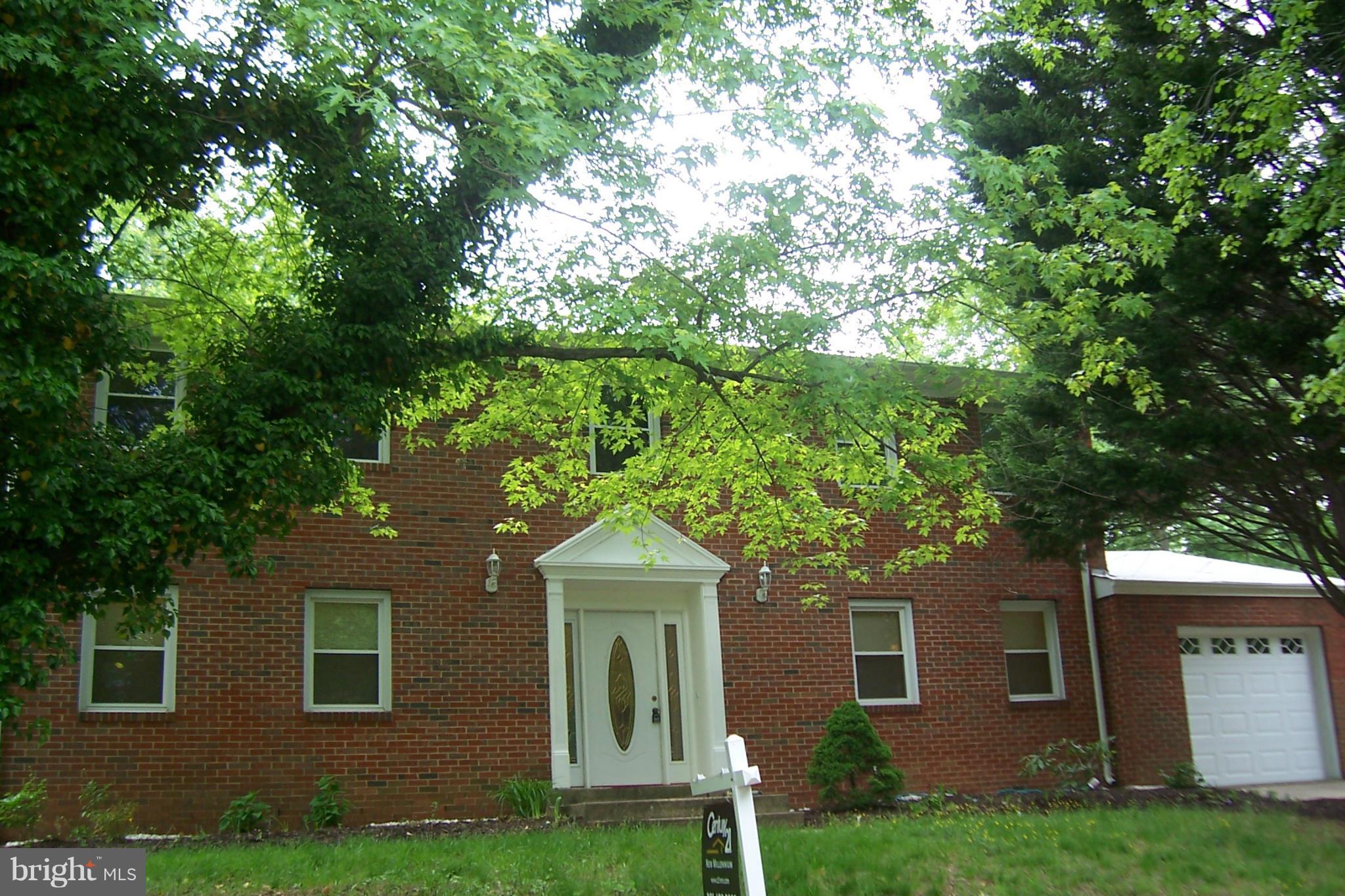 New roof, 5 bedrooms upper level, attached garage and wood floors-clean/updated. Big eat in kitchen has new granite counter tops, beautiful cabinets.Formal living and dining rooms, family room with fireplace. Deck overlooks level backyard with fence. Large master suite with new vanity next to huge walk in closet. Most rooms are larger than average.New neutral carpet,paint.