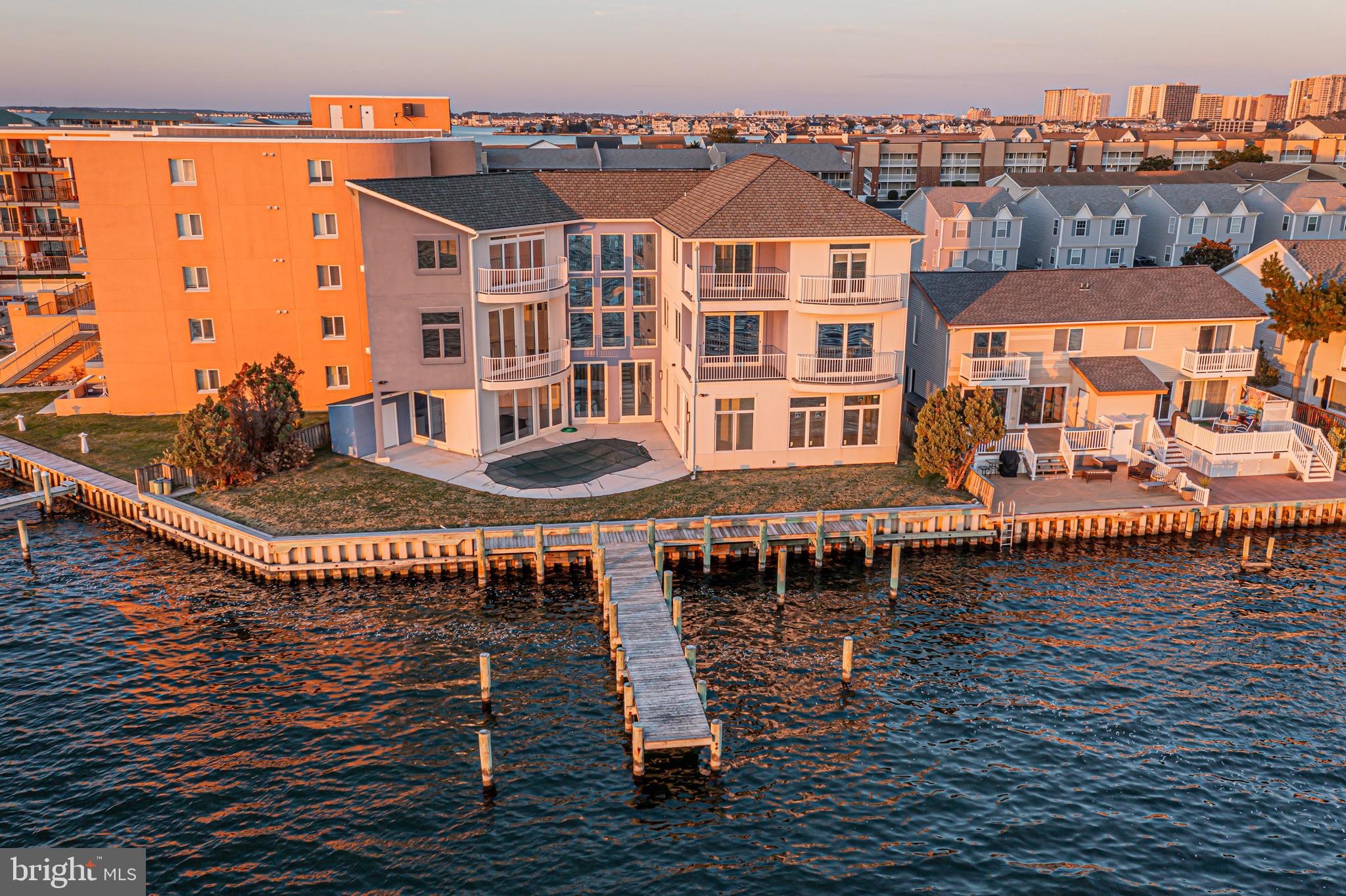 Welcome to a truly exceptional residence where luxury meets waterfront tranquility. This stunning 5-bedroom, 6-full-bathroom, and 2-half-bathroom Bayfront home, epitomizes coastal elegance with 145 feet of direct bay frontage and captivating southern exposure. Step through the elegant front door and be immediately entranced by the intricate details and high-end upgrades throughout. The majestic foyer, adorned with pristine marble flooring, draws your gaze toward the breathtaking Bayfront views and the inviting swimming pool nestled in the courtyard. Whether you are seeking a permanent residence or a luxurious vacation home, 733 Bradley Rd is a rare gem offering unparalleled coastal living. Don’t miss the opportunity to experience this extraordinary home—schedule your visit today!