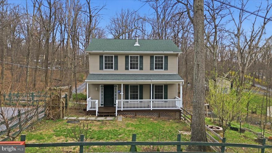 Beautiful Colonial style home on corner lot nestled in the woods of Shannon dale ! This Stunning home  is situated on over half an acre of land and has fully fenced yard! NO HOA Bring all your Animals!! New features including new paint inside and out !  Enjoy those long summer nights on the inviting front porch. Large 12' x 12' rear treated deck and 1 storage sheds. Home offers 1680sqft of finished living space and walk-out basement could easily be finished to add additional sqft. Easy Commute to Virginia and minutes away from Charles town an harpers ferry ! Schedule your private tour today!