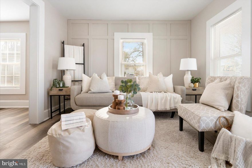 Beautifully designed home featuring 2 bedrooms and 1 bathroom. Thoughtfully updated throughout with custom accent walls, stylish light fixtures, and a welcoming dining area that flows seamlessly into the modern kitchen. The kitchen boasts stainless steel appliances, quartz countertops, and ample cabinetry.

The bathroom showcases a chic, contemporary design with quality finishes.

The lower level offers generous additional space with an appealing industrial aesthetic—perfect for a home office, studio, gym, or recreation area.

Enjoy a spacious backyard, perfect for outdoor gatherings, gardening, or relaxing in your own private oasis.