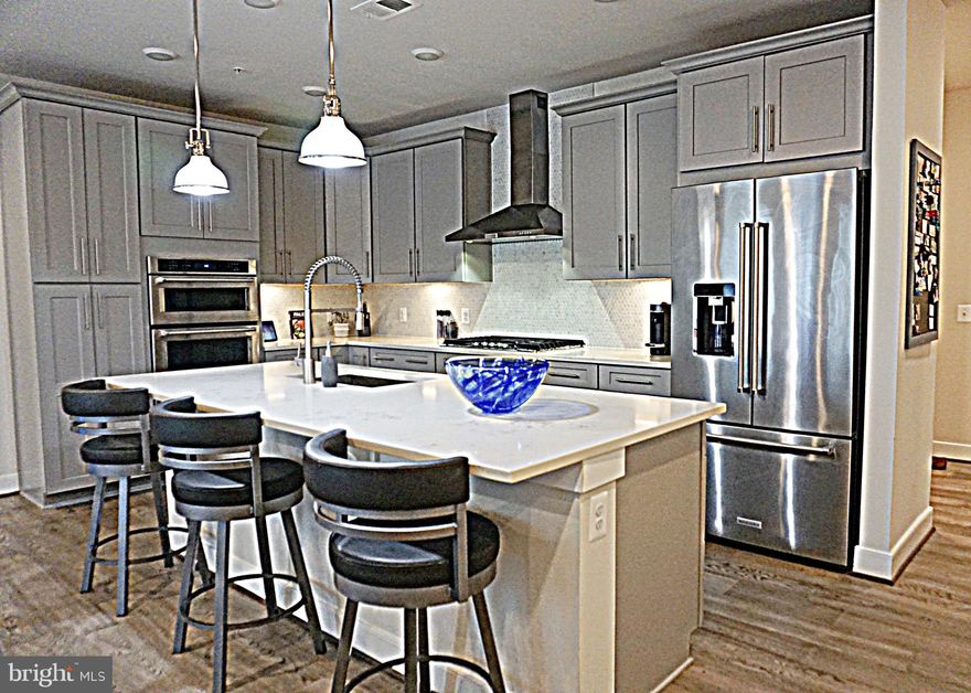 **OPEN HOUSE 8/18 2-4pm** A sparkling gem in the Flat at Crown!  In its pristine condition and beautifully maintained a 2 bedrooms/2 bathrooms unit with a den, plus 2 parking spaces.  It offers a lifestyle that blends with luxuries and convenience in the center of Downtown Crown.  
Open-concept floor plan throughout this unit with a modern home vibe.  Builder upgrades, high-end brand appliances, luxurious vinyl planks floorings, gourmet kitchen with large center island, beautiful quartz countertops, upgraded cabinets, luxurious shower room with duo shower heads in the master’s suite, spacey walk-in closet, plus a spacious den to be office/studio.  Indoor parking - 2 parking spaces are included, with easy access to the elevator, and ample street parkings are available.  For amenities, you can relax and immerse in the retreat center enjoying exercise rooms, an outdoor pool plus tot playground, mini golf putt, and tennis court.   Close to the Downtown Crown and the Rio, with retails, shops, restaurants, groceries and much more.  Easy access to major highways, also shuttle bus service to the metro.