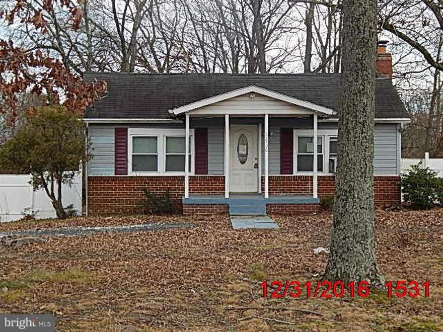 PRICE SLASHED ALMOST $40,000!!! Great sweat equity opportunity. Feel like you're living in the country, but just a quick trip to the Beltway & DC. House has updated vinyl windows and siding on 3 sides. Needs some repairs and cosmetics to shine again and make it a great starter home. Live CHEAPER THAN RENT!! Sold in "as is" condition. No FHA/VA financing