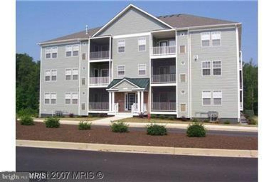 2 bedroom, 2 bath Condo features kitchen with Granite counter tops and  living room with gas fireplace. Additional features include a screened porch, storage and an underground parking garage with 1 assigned space.