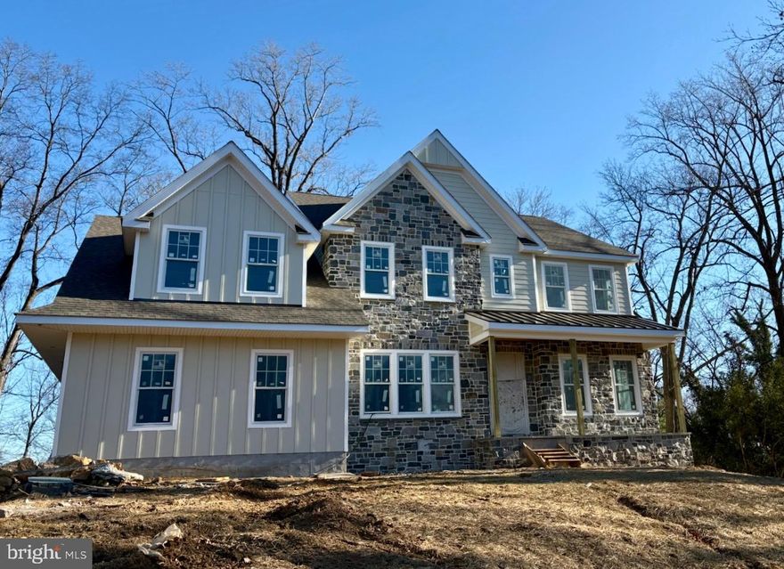 Currently under construction and nearing completion!  Located in South Wayne on oversized 1+ acre lot walking distance to the Radnor trail or downtown Wayne. The inviting floor plan with fabulous in place finished hardwood floors creates a warm feel with a chic vibe. From the foyer you can either enter a study/living space or proceed to the enclosed  porch from the family room. The formal dining room has a serving butler station with sink and leads to the chef's kitchen with commercial appliances, solid custom wood cabinetry, wall cabinetry with open shelving  with  refrig/freezer including a waterfall style island countertop. To the rear of the kitchen sits the informal powder room, a large kitchen pantry closet, cloak closet and room for a office desk/ cubbies hallway  The large family gathering area embraces breakaway doors extending the inside to the outside with covered patio & fireplace. Choose to stay inside and enjoy the warm finishes complete with wood or gas burning fireplace and TV station. The second floor features a master bedroom with a reading nook. The ample closet space and a master bath with make up vanity completes the owner space. The second floor retreat creates a cozy nook for homework, a kids schooling area or just a lazy retreat while the remainder of the floor includes a large built in laundry room, 4 additional bedrooms with bath and out of season closet. The basement level offers a playroom and ample storage or area for other uses.