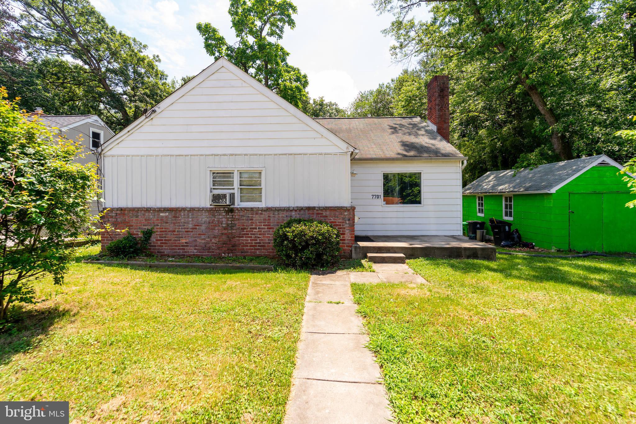 Nestled in the quiet, tree-lined streets of Landover Hills, MD, this charming two-story home is brimming with potential. Whether you're a first-time buyer or an investor seeking a high-potential property, this home offers endless possibilities.
Inside, you’ll find hardwood floors, ceiling fans, and a cozy fireplace. The kitchen has an open shelf pantry and a lazy Susan for easy access to everything. The finished den in the basement adds extra living space, while the unfinished utility area offers even more customization. The main floor includes two bedrooms and a full bathroom, while the attic can serve as a versatile space for a second bedroom or additional storage.
Big updates have already been taken care of, including a new roof and front porch (2010) and an electrical heavy-up (2010). There’s also a detached garage for parking and storage.
Close to I-95, Route 50, and access to the upcoming Purple Line and well established Amtrak lines at the New Carrollton Metro. You’re just minutes from shopping, schools, churches, a library, a fire department, and a post office. New Carrollton is also growing fast, with lots of new development and a booming economy.
One of the best perks? A path right next to the backyard leads to the West Lanham Hills Community Center, park, and playground—perfect for getting outdoors and enjoying the neighborhood.
Nature lovers will appreciate the occasional visit from local deer, adding a touch of nature's beauty to your peaceful surroundings - a perfect blend of comfort and wildlife.
If you’re looking for a solid home with great potential in a convenient location, this is the one!