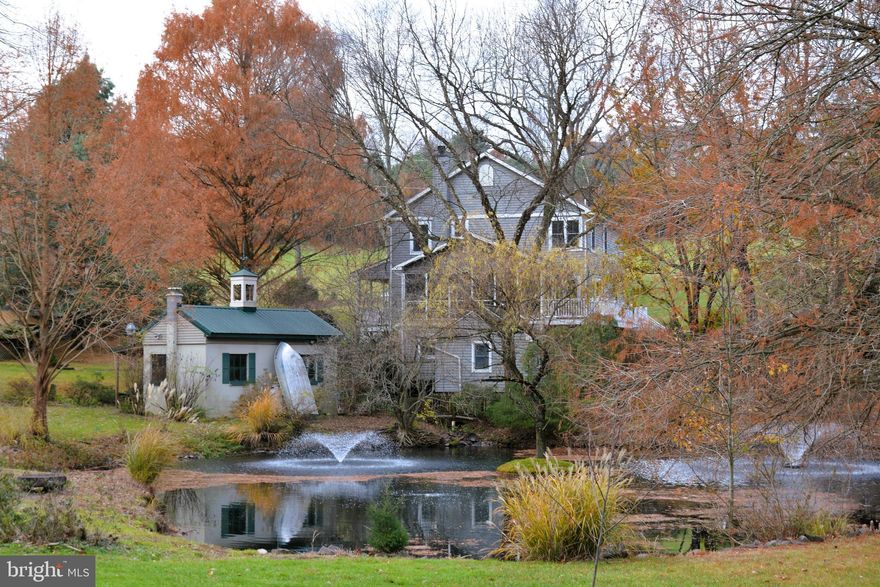 Historic Cumru Township Estate with a Custom Farmhouse built in 2021. This charming modern farmhouse-style design features a 4-bedroom, 3.5-bathroom home spanning 3542 square feet with three fireplaces, upper and lower laundry rooms, an in-ground pool, and a hot tub surrounded by a nature-inspired hardscape. A harmonious blend of comfort and style, using an open floor plan with spacious living areas, an elegant kitchen, and a unique design to complement and access the stunning views of nature at this Equestrian Estate. 

The rustic yet refined architectural elements, make this home perfect for those seeking a warm and welcoming retreat in a timeless design to accommodate indoor and outdoor country living. Explore the possibilities of peaceful living in this Farmhouse with 7+ acres of pastoral rolling countryside with verdant pastures, woodlands, a spring-fed Pond with Two Fountains, a Tack House with Belfry with an antique Bell, a Koi Pond, Bridge, Gazebo overlooking the Pond, Trellis, Two Horse Barns with Stalls, Chicken Coop, 3 Car Garage and ample LED outdoor lighting. 

Conveniently located in Mohnton with numerous highways that serve Cumru Township, including Interstate 176, U.S. Route 222, U.S. Route 222 Business (Lancaster Pike), U.S. Route 422, PA Route 10, PA Route 625, and PA Route 724. I-176 follows the Morgantown Expressway southward from its northern terminus at US 422 across the eastern portion of the township.

The new construction 2021 home has a portion of the original foundation that contained the Koi Fish Pond, Bridge, and Stream preserving the Natural Beauty of the Mature Landscaping. The design incorporates the character of the original Farmhouse, giving enhanced access to an incredible landscape to enjoy, and the luxury of modern amenities of a newly constructed home.

The current Owner designed and constructed the Modern Farmhouse keeping with the character and historical elements to enhance access to the vibrant natural beauty that penetrates all areas of the property. The in-ground Pool, Patio, and Hot Tub areas were specifically designed so the hardscape would blend into the tranquility of the natural surroundings. The Gazebo Dining Area that overlooks the fountains, Recreation Areas, and Koi Pond Bridge is accessed from the Lower and First floors.

This Sale is for Three Properties 7.6 Total Acres:  441 Imperial Drive Mohnton, PA 19540-8341- .38 Acres,  445 Imperial Drive Mohnton, PA 19540-8341- 4.94 Acres, 455 Imperial Drive Mohnton, PA 19540-8341- 2.28 Acres. The 7+ acres of pastoral rolling countryside with verdant pastures, woodlands, a spring-fed Pond with Two Fountains, a bridge, and a Gazebo surrounded by mature exotic landscaping,

Meticulous landscaping throughout the property with clearly defined perimeter property lines outlined by fence polls. The original pastureland contained four separate Horse Paddocks. There is one remaining Fenced Horse Paddock below the rear Horse Barn to the left of the Gazebo. The existing electric fence wiring along the left side of the property has been removed leaving the existing fence polls that are in good condition.

The Timber-framed Horse Barns are in relatively good condition and are solidly built with pure purpose and expert Turn of the Century Craftsmanship. With some minor maintenance, the Barns and Pasturelands can be restored to the Historic Glory when first built, along with any custom amenities to suit an Equine Owner's plan development. The pristine separate Wells of each Barn will provide abundant fresh water for any current or future potential uses.

The front existing Horse Paddock is ideal for Equine grazing. The remaining 3-4 acres of pastoral rolling countryside with verdant pastures are available to construct additional Paddocks. The unique rolling curvature of pastureland makes it ideal for shortened Horse turnouts, Stride development, or rehabilitative exercising for stronger stifles for older or injured horses.