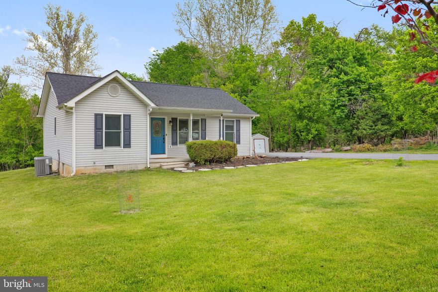 Welcome to 225 Cedar Creek Dr — a beautifully updated home set on a well-maintained lot with a long private driveway in Harpers Ferry.

This 3 bedroom, 2 bath home offers over 1,100 square feet of thoughtfully refreshed living space, including a primary suite with an attached bathroom and walk-in closet. Recent improvements include a new roof, HVAC system, fresh paint, luxury vinyl plank flooring, invisible fence, updated bathrooms, and a renovated kitchen featuring new appliances.

Inside, the home feels bright, clean, and move-in ready, with a layout that maximizes both comfort and functionality. Each space has been carefully updated to create a cohesive and inviting feel throughout.

Step outside to enjoy a spacious yard and a refreshed deck — perfect for relaxing or entertaining. The property also offers true seasonal views, adding to the overall setting and appeal. Additional features include a water softener, generator, and multiple storage options with both crawlspace and attic access, as well as a detached outbuilding for additional storage or workspace.

No HOA and ideally located close to commuter routes, local amenities, and the outdoor recreation Harpers Ferry is known for — this home offers the updates, setting, and convenience buyers are looking for.