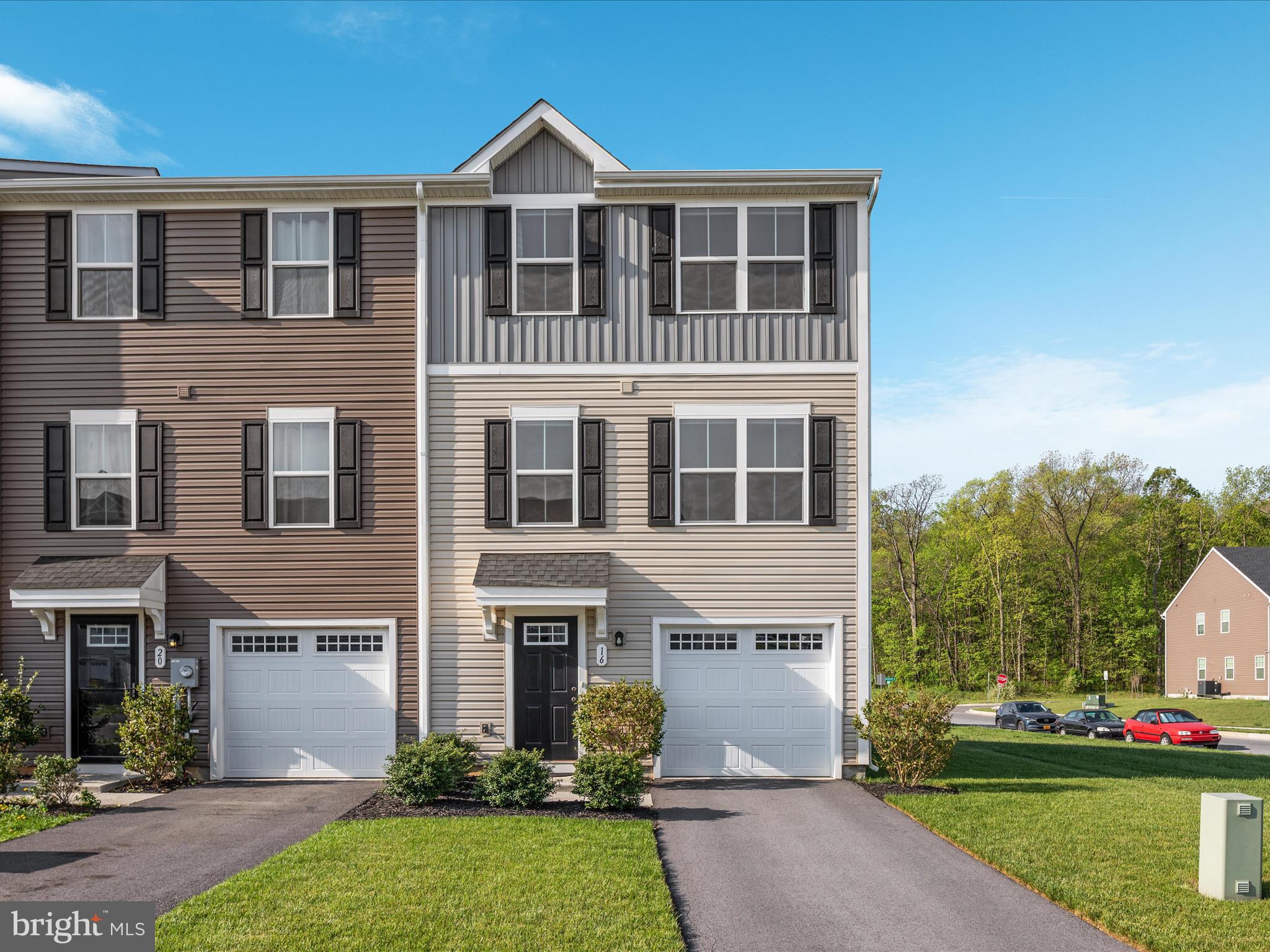 Welcome to 16 Wiggles Court, a meticulously maintained end unit townhome located in The Lakes at Martinsburg. From the moment you step inside, you’ll appreciate the flexible entry level layout featuring a finished bonus space, perfect for a home office, gym, playroom, or hobby room. A convenient storage closet and access to the garage complete this level.
Upstairs, the main living area is designed with everyday comfort in mind. The kitchen offers plentiful cabinetry, granite counters, a center island, and stainless steel appliances including a gas stove. It flows seamlessly into a light-filled family room, creating a warm and open living space. A lovely dining area sits just off the kitchen. From there, step outside to your 10x16 composite deck with vinyl railing, a perfect spot for morning coffee or evening relaxation. A convenient powder room completes the main living level.
The upper level features a spacious primary suite with a walk-in closet and private full bath. Two additional bedrooms share a full hall bath, and the laundry area, complete with washer and dryer, adds everyday convenience.
The Lakes at Martinsburg offers community amenities including a pavilion, dog park, and tot lot. Located just minutes from I-81 with easy access to shopping, dining, schools, and medical services, this home puts everything you need within reach. Schedule your tour today.