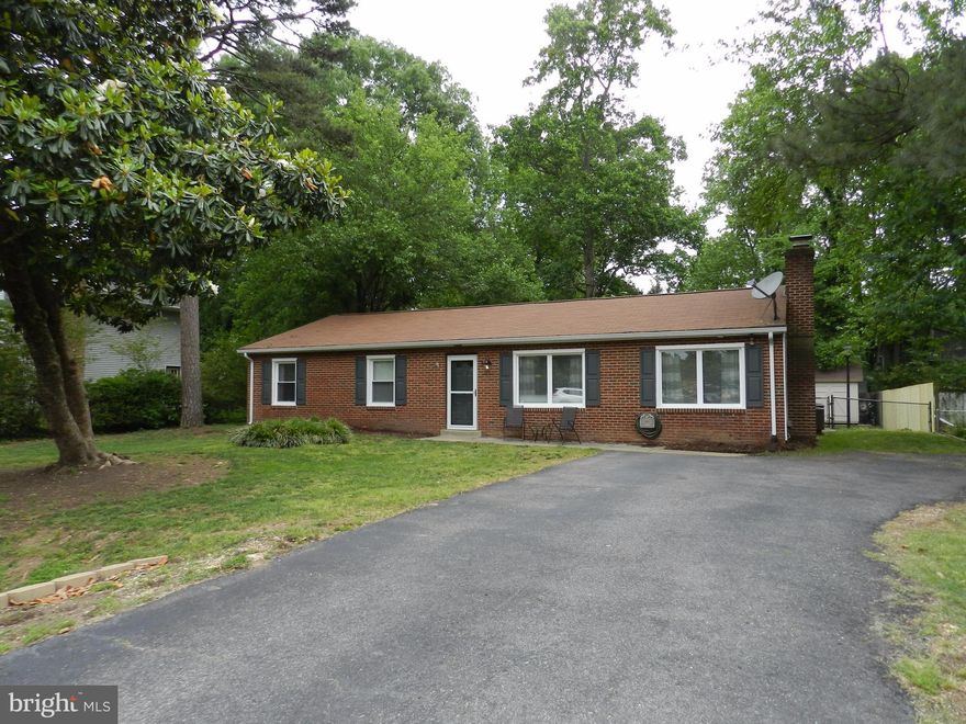 Gorgeous One Level Living located minutes from VRE and I-95! Brick Front Rambler situated on a lushly landscaped, partly wooded lot with fenced in rear yard, patio and shed.  Cherry Hardwood Floors fill this spacious home with updated kitchen and bathrooms. HWH and HVAC less than 1 year old and Roof is less than 5 years old. Bright and Sunny All Seasons room is perfect for relaxing all rear round!