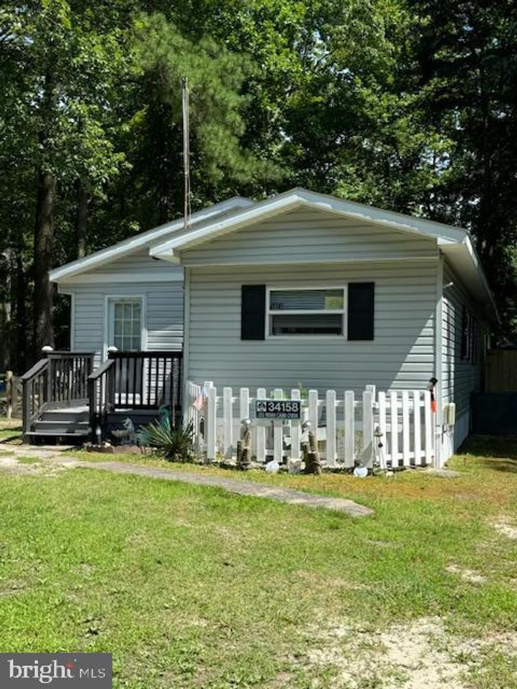 Photo of 34158 Indian Cabin Creek Road, MILLSBORO, DE 19966 (MLS # DESU2107944)