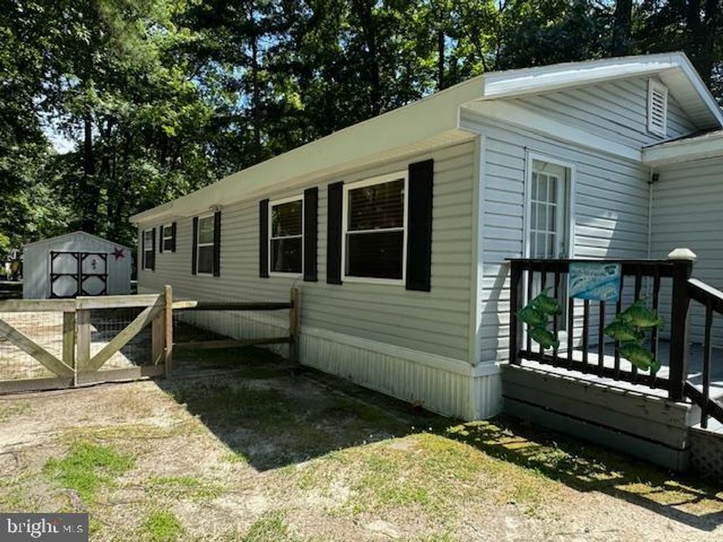 Photo of 34158 Indian Cabin Creek Road, MILLSBORO, DE 19966 (MLS # DESU2107944)
