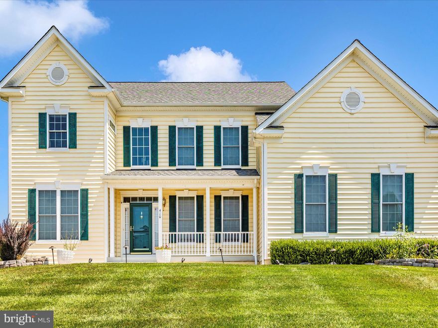 Welcome to 410 Richard Roberts St — a beautifully upgraded colonial nestled on a spacious corner lot in the desirable Royal Oaks community. Just a short stroll from the shops and restaurants of historic Main Street, this move-in ready home offers nearly 4,000 square feet of living space, including 4 bedrooms, 3.5 bathrooms, and an oversized 2-car garage. Inside, you’ll find thoughtful upgrades and custom touches throughout — from the luxury vinyl plank flooring and 9-foot ceilings to the elegant dual staircases leading to the upper level. The sun-drenched Florida room, media room with bar area, and a dedicated exercise room provide ample space for relaxation, recreation, and entertaining.  At the heart of the home is an expansive open-concept kitchen and family room, ideal for gatherings and everyday living. Step outside to enjoy the beautifully designed deck and patio, enhanced by extensive hardscaping — the perfect backdrop for outdoor entertaining or a quiet evening under the stars. Don’t miss this opportunity to own a one-of-a-kind home in one of the area’s most charming neighborhoods!