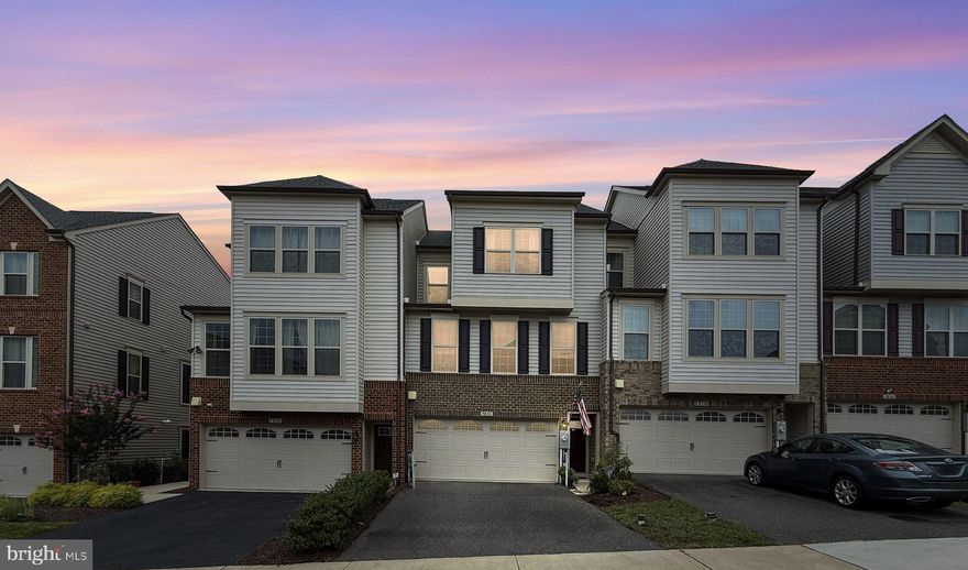 Rare Opportunity – VA Assumable Loan at 2.875%! Ask about assuming this loan with a little less than 20% down and enjoy the benefit of today’s below-market interest rate.

Welcome to this beautiful 3-bedroom, 2 full & 2 half bath townhouse with a spacious 2-car garage, thoughtfully designed for modern living and style. The gourmet kitchen boasts quartz countertops, stainless steel appliances, and upgraded cabinetry, flowing seamlessly into bright dining and living areas.

Step outside to a private patio with a stone fireplace—perfect for year-round entertaining. Upstairs, the primary suite features a tray ceiling, walk-in closet, and a spa-inspired bath with dual showers and vanities.

Enjoy community amenities including a clubhouse with event space, fitness center, outdoor pool, walking trails, and playgrounds. Conveniently located near Fort Meade, BWI Airport, Amtrak, shopping, dining, and major commuter routes including 295 & 95.

Move-in ready with comfort, style, and a prime location—don’t miss this chance to lock in one of the best rates available!