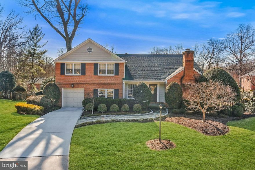 Discover to 11300 Rolling House Road, tucked at the end of a quiet cul-de-sac on an oversized, level 0.29-acre lot in the sought-after Old Farm community of North Bethesda. This spacious split-level home offers classic finishes that exude timeless elegance, with 3,994 total square feet across four levels, including 6 bedrooms, 2 full bathrooms, and a powder room.
 Lovingly maintained by the original owners, notable updates include: New Roof (2020), New Hot Water Heater (2025), Original Water Service Line Replaced by WSSC (2018), New Laminate Wood Flooring in Basement (2026), New Family Room Carpet (2026), Newer Garage Floor and Paint, Heavy-Up Electrical Added, Renovated Primary Bathroom, and Professional Landscaping.
 A flagstone walkway welcomes you inside to an interior highlighted by gleaming hardwood floors and stairs, crown molding, and distinctive hardware. The formal living room features a wood-burning fireplace with an ornate mantel accented by dentil trim. The living room opens to the formal dining room, framed by a large window overlooking the backyard. The spacious, centrally located kitchen offers a walk-in pantry, table space, white cabinetry, tile backsplash, Corian counters, recessed lighting, and painted wood-beam ceiling accents. A door from the kitchen opens to the rear paver patio and backyard.
 Upstairs, the spacious primary suite includes a walk-in closet with built-in shelving and an en-suite bath with a glass-door shower, modern vanity, and an adjoining dressing area with an additional vanity. Adjacent to the primary suite is another bedroom, perfect for use as a sitting room, nursery, or office. Three additional bedrooms, a full hall bath, and a linen closet complete the upper level.
 The lower level, fully above grade, features a light-filled family room with new carpet, a fireplace set in a brick accent wall, and sliding glass doors that open to the patio and fully fenced backyard. This level also includes a flexible 6th bedroom or office, a powder room, and garage access.
The basement offers flexible space with new laminate wood flooring, ideal for a home gym, playroom, or workshop.
 Outside, enjoy the expansive, fully fenced backyard with a large paver patio and open green space, perfect for relaxing or entertaining. Meticulous landscaping, garden beds, and mature trees establish a serene, private outdoor setting.
 Ideally located near shopping, dining, entertainment, and major commuter routes, this home also offers easy access to parks, recreation facilities, and several nationally rated golf courses. Top-rated Montgomery County schools complete the package.
 Don’t miss this opportunity to own in one of the DC area’s most sought-after communities!