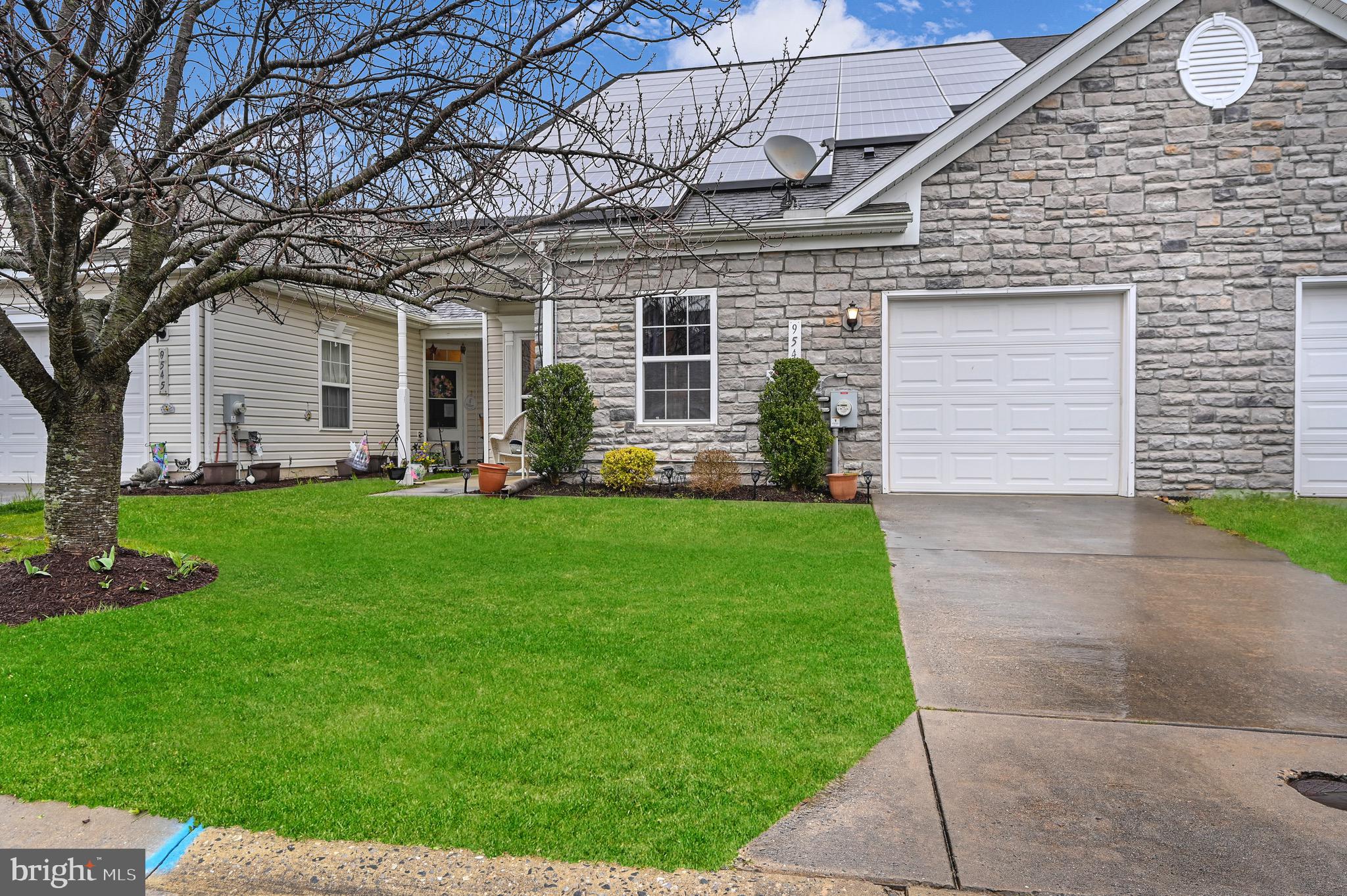 Welcome to Wood Creek Community, where you can embrace a more simplified lifestyle. Say goodbye to the hassle of lawn care , as we take care of it all for you. Take full advantage of the community clubhouse, fitness room, and inground pool. This townhouse has been lovingly maintained by its owner since 2006. From the moment you step through the front door, you'll instantly feel at home. The seamless flow from the kitchen to the dining area and living room creates a warm and inviting atmosphere. With cathedral ceilings in the living room, you can even catch a glimpse of the loft above. On the first level, you'll find the spacious master suite, complete with a walk-in closet, double sink vanity, corner soaking tub, and a convenient stand-up shower. The kitchen also boasts a generous pantry, making storage a breeze. The laundry room is conveniently located near the garage entrance, ensuring ease of use. An additional bedroom and full bathroom complete the first level. As you make your way upstairs, you'll be greeted by an oversized loft area, perfect for customizing to fit your needs. Whether you envision a home office, hobby space, or cozy reading nook, the possibilities are endless. Another large bedroom, featuring a walk-in closet and full bathroom, awaits you on the second level. This townhouse offers the perfect blend of functionality and style, making it an ideal place to call home. *Home Inspection has been completed for you as well.