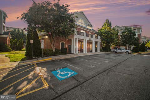 Photo of 12956 Centre Park Circle #317, HERNDON, VA 20171 (MLS # VAFX2316524)