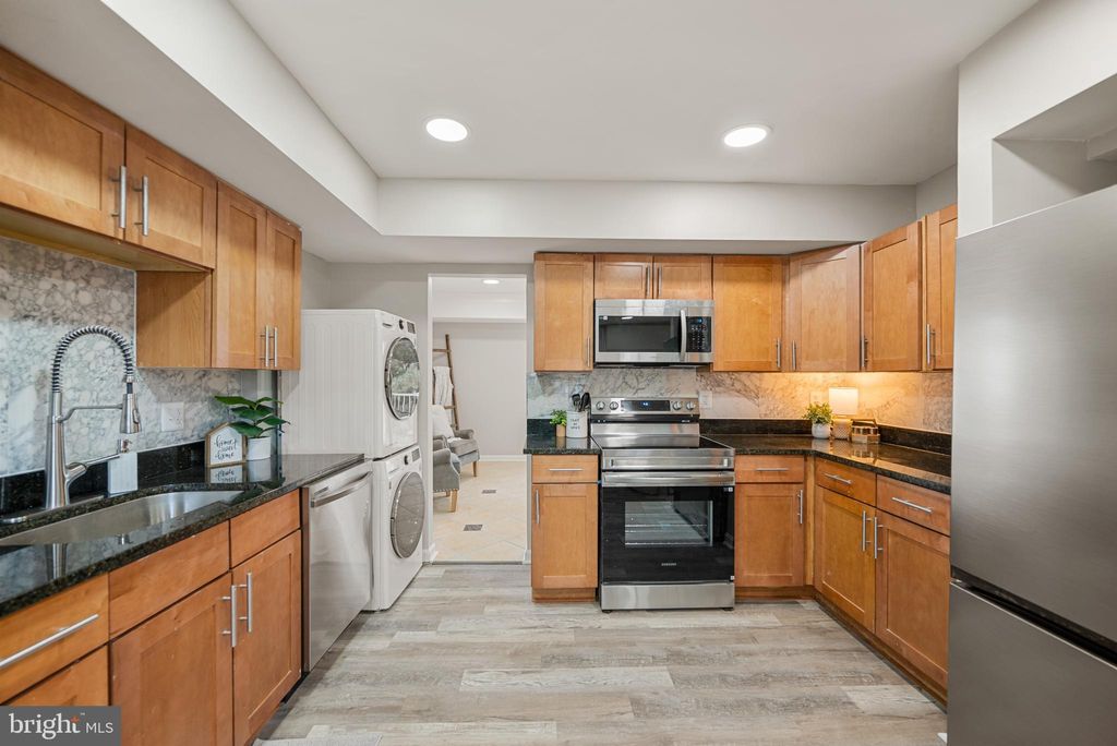 Photo of 14487 Rustling Leaves Lane, CENTREVILLE, VA 20121 (MLS # VAFX2273916)