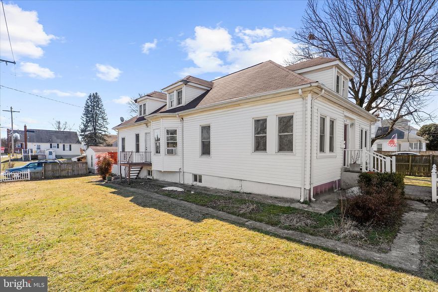 Spacious 3-bedroom, 4 full bathroom home situated on a corner lot with a fully fenced yard, off-street parking, and a large deck with sunshade — perfect for outdoor enjoyment. Detached shed with electricity provides added storage or workspace. Flexible layout with a full bathroom on every level. The upper level features a private entrance, bedroom, full bath, kitchenette, and updated windows — ideal for guests, extended living, or potential secondary living space. The main level includes a kitchen, sitting room, spacious living and dining areas, primary bedroom with en-suite bath, second bedroom, additional full hallway bath, and a rear bonus room for added versatility. Finished lower level offers open-concept living with carpet, gas fireplace, full bathroom, and walkout access. Plenty of space, functionality, and potential — ready for its new owner.