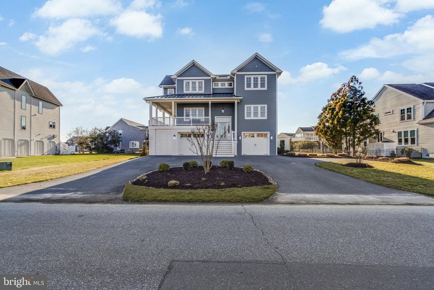 Remarkable residence in Rehoboth Yacht and Country Club with expansive bay and golf course views. large rooms bathed in light and multiple indoor and outdoor entertaining areas.  This 4 Bedroom 4 Full and 2 Half Bath home is a must see and truly one of a kind.   No expense has been spared from the gourmet kitchen, to the custom furnishings and lighting throughout.  New 2023 addition included large indoor and outdoor entertaining spaces featuring two fireplaces, a wet bar/kitchenette, and an exercise area, all with direct access to the new inground pool and hot tub.