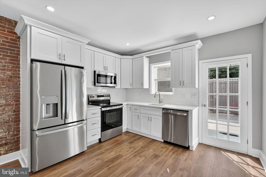 Welcome to this beautifully renovated 2-bedroom, 1-bathroom home combining modern style with classic charm. The open-concept main level features an exposed brick accent wall, custom iron railings, and a brand-new kitchen with high-end finishes, stainless steel appliances, and sleek cabinetry. The stunning bathroom offers a stand-up shower with a custom sliding glass door. Enjoy extra living space in the finished basement and a private outdoor area with new concrete. Additional upgrades include new windows, HVAC, and contemporary lighting throughout. Ideally located within walking distance to Tacconelli’s, Kitty’s, and Nemi—this home blends comfort, craftsmanship, and convenience in one perfect package.