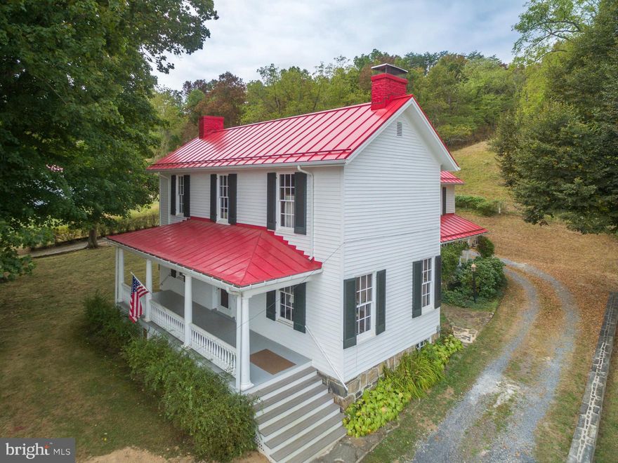 Beautiful 23 acre farm with 4 horse stalls in Carriage House plus a 2 level 20 'x 60' barn. This Federal Style Country House is located in the village of Burlington a National Historic Landmark.  Property has fenced pasture, pond, some wooded areas and great views. Less than 1/2 hour to I 68 at Cumberland MD and less than 1 hour to I 81 at Winchester VA. WELL MAINTAINED HOME.