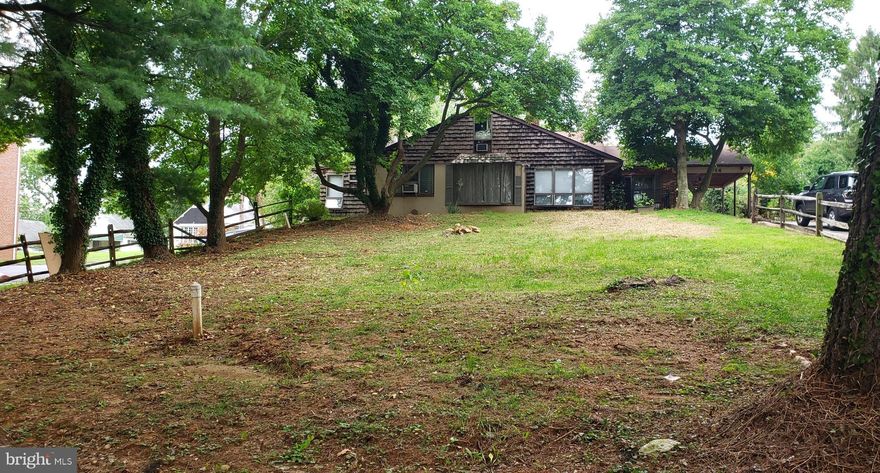 Spacious rancher with lots of living areas and partial 2nd level.  Located in the convenient location of the Cedonia area close to major routes, public transportation and shopping.  There is potential for even more living space by renovating the attic rooms and/or opening up the cellar basement. (Door to lower level is in the kitchen.) Features include; high ceilings/vaulted, some wood floors, lots of windows, two full bathrooms, stained glass, separate dining room space, and the yard.  This is an ENORMOUS lot with tons of off street parking.  This could be your private garden oasis in the city! This home needs complete updating and seller will make absolutely no repairs. Property will not work with an FHA or VA loan but is possible with conventional, and definite with renovation products and cash. What an opportunity for a savvy investor or a home owner wanting to creat their unique living space!