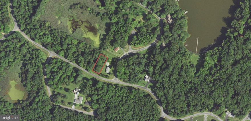 Lot 225 & 226 - .42 acre lot in Chesapeake Landing which has a voluntary HOA that allows you access to the marina, boat ramp & a boat slip for an additional fee. Perc Approved. Perfect place to build your home or spec house!