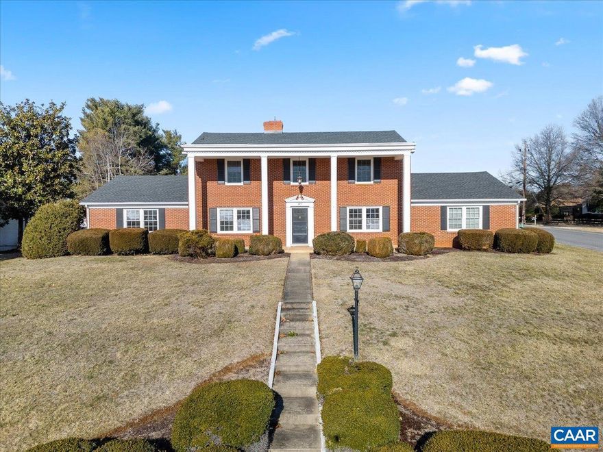 SPRING into your dream home where fresh beginnings & timeless charm await. This stunning custom-built Colonial brick home is nestled on a corner lot in the Virginia Village/Pelham neighborhood. This beautiful residence offers a generous 3,293 finished square feet of living space, featuring 4 spacious bedrooms and 2.5 bathrooms, providing ample room for both relaxation and entertainment. The large living spaces are designed for comfort and convenience with cozy fireplaces as the perfect focal point for gatherings in the family room and living room. The kitchen is designed with functionality in mind, offering plenty of counter space and storage as well as brand-new stainless-steel appliances and a large sink for your culinary needs. The adjacent dining room is ideal for hosting meals or dinner parties. In addition to the spacious bedrooms, this home features two versatile smaller rooms that can be adapted to suit your needs. The basement adds versatility, with over 1900 sq ft unfinished space. Relax and take in stunning mountain views from the comfort of your front porch or enjoy the 3-season back porch with guests or a book. Don?t miss out on this exceptional property?schedule your showing today. 50 yr roof installed 2022.,Painted Cabinets,Solid Surface Counter,Fireplace in Family Room,Fireplace in Living Room