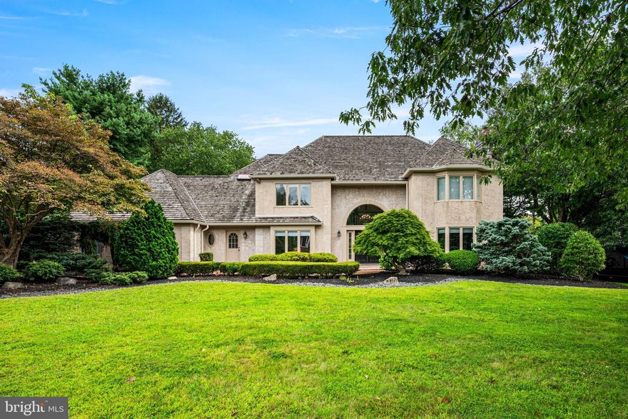 Stately French Colonial in Northside Bryn Mawr - Tucked away on a quiet cul-de-sac in Northside Bryn Mawr, this elegant French Colonial residence blends timeless architecture with luxurious modern updates. Set on a professionally landscaped .62-acre lot in the renowned Lower Merion School District, this exceptional move-in ready property offers over 4,800 square feet of refined living space, plus an additional approximately 1,000 square feet of fully finished lower level space.  A brick pathway leads to grand double entry doors, opening into a dramatic two-story foyer filled with natural light. A sweeping staircase anchors the space, setting the tone for the thoughtful floor plan that balances formal elegance with comfortable everyday living.  The main level includes formal living and dining rooms, and a spacious den/home office. The heart of the home is the gourmet kitchen, featuring Wolf and Subzero appliances, custom maple cabinetry, granite countertops, subway tile backsplash, and a center island that opens to a sunny breakfast room and expansive family room. French doors open to a spacious screened-in porch and newly built deck, perfect for al fresco dining and relaxed evenings.  A thoughtfully designed wing just off the kitchen includes a laundry room with a large farm sink, a second powder room, a mudroom with custom built-ins, and a second home office/command center with a rich walnut custom built-in workstation. Just off the mudroom there is direct access to the large two-car garage.  The private rear yard is truly a resort-like retreat. Enjoy a heated, in-ground pool with new tile, resurfacing, and equipment, a sundeck , and a second seating area perfect for an outdoor dining set and patio furniture.  All making for an ideal space for three seasons of entertaining. The fully fenced yard also features an elevated irrigated garden bed, a newly built seating area perfect for a fire pit, and an indoor/outdoor sound system to enhance every occasion.  Upstairs, the luxurious primary suite impresses with vaulted ceilings and custom wood arches, two newly installed California Closet walk-ins, and a spa-inspired bathroom with natural stone tile, soaking tub, glass-enclosed shower, dual vanities, and private water closet. Three generously sized bedrooms complete the second level, including a junior suite with private bath and a Jack-and-Jill bathroom both with new vanities from Lavish in Ardmore.  The finished lower level adds incredible versatility with a custom bar, home theater area with projector and screen, California Closet storage system, half bath, and plenty of space for a home gym or playroom.  Additional features of this home include a new French drain, new gutter and downspout systems and new dual-shade window treatments throughout.  This Northside Bryn Mawr location offers a short walk to Harriton High School and is just minutes to many of the region’s top private schools.  Regional rail and major highways are close by, providing for a short commute to Center City, Conshohocken and King of Prussia.  This turn-key property offers the perfect blend of location, luxury, and lifestyle.