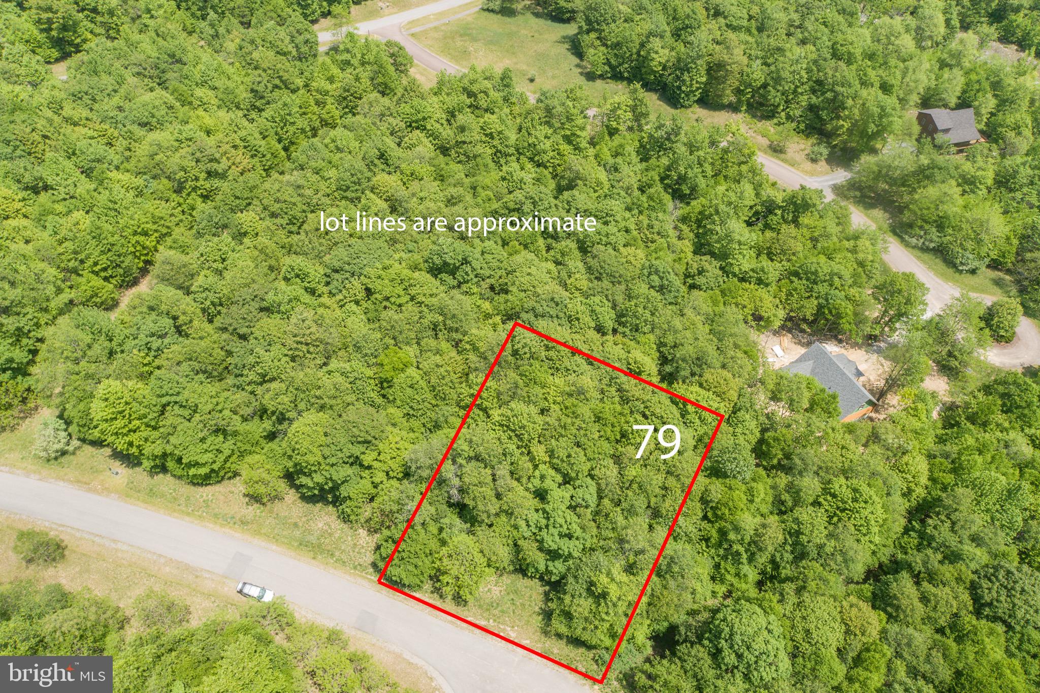 0.57 acre mountaintop homesite at Deep Creek Lake! Competitively priced and ready to build. This property offers location just minutes from Wisp, ASCI and all of Deep Creek Lake's amenities with a private feel towards the end of the cup-de-sac. Public water and sewer taps are paid! Huge savings for buyer worth several thousand dollars . Electricity is to site. The only thing missing is your dream mountain getaway home!
